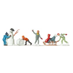 Niños con muñeco de nieve y trineo 0212230 Merten Escala H0